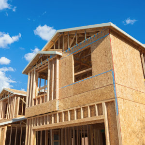 background image of a house being constructed
